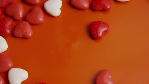 Rotating stock footage shot of Valentines decorations and candies - VALENTINES 0051