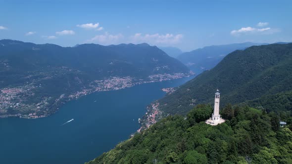 Faro Lighthouse Lake Como Italy. Drone flyover. Italy travel background.