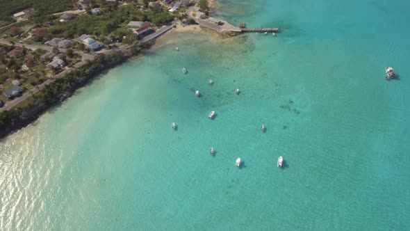 Aerial drone view of a fishing motor boat in the Bahamas, Caribbean. 