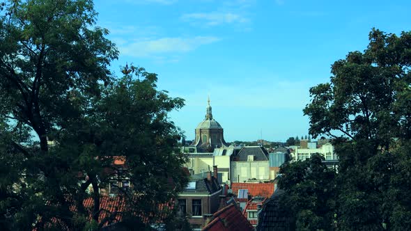 Timelapse shot of Leiden City during beautiful summer day and old Marekerk Church in background.