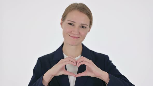 Young Businesswoman Showing Heart Shape By Hands on White Background