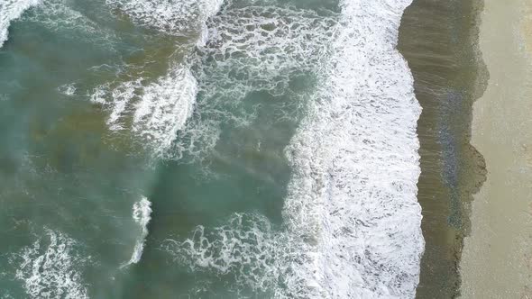 Vitality of Blue Energy and Clear Ocean Water Powerful Stormy Sea Waves in Topdown Drone Shot