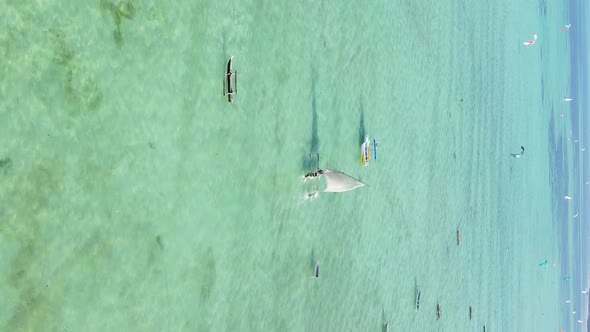 Tanzania Vertical Video  Boat Boats in the Ocean Near the Coast of Zanzibar Aerial View