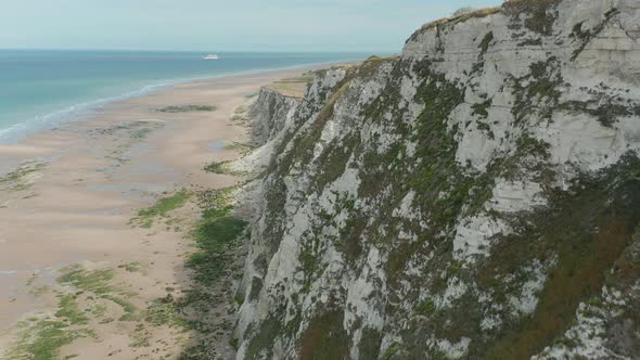 Epic White Cliff From Aerial Birds View Perspective with Green and Brow Pasture