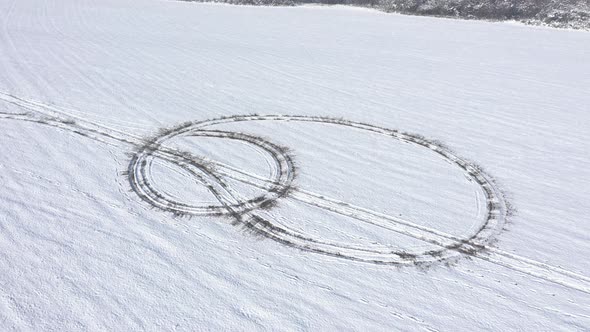 Circular trails made with vehicle tyre 4K aerial footage