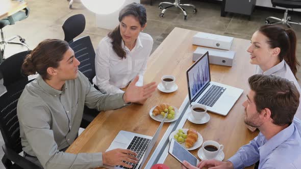 Executives working together at desk 4k