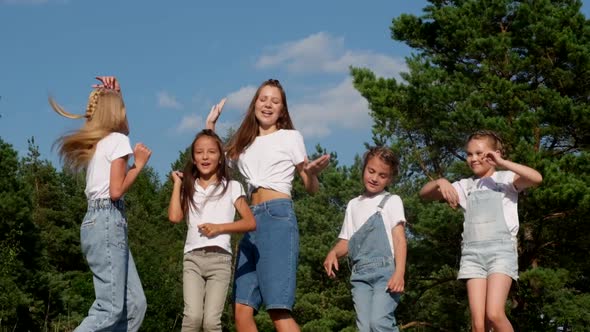 Happy Children Having Fun on Vacation in a Tent Camp