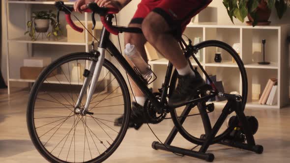 Sportsman Riding Bicycle Home Gym