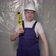 Builder in Blue Overalls and White Hard Hat Helmet and Protective Glasses - VideoHive Item for Sale