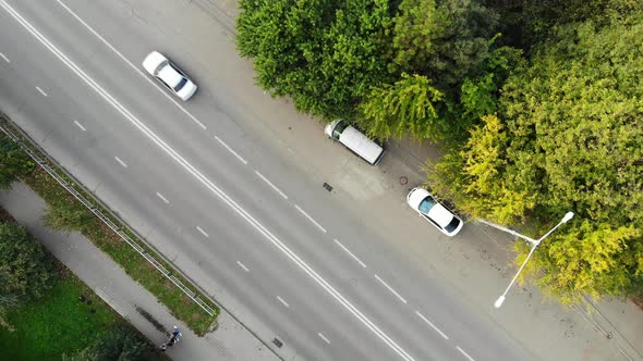 Cars from the height. Aerial view of the road.