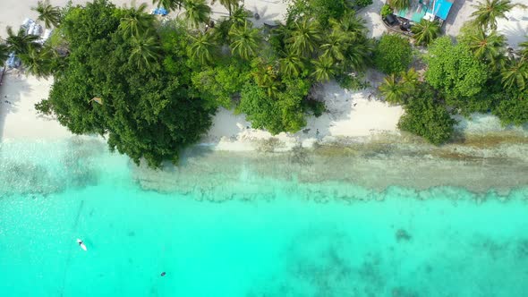 Luxury overhead abstract view of a white sandy paradise beach and aqua blue water background