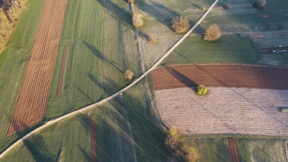 Flying over farmland and countryside on a spring morning