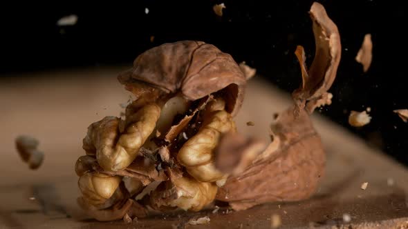 Hammer breaking Walnut, juglans regia, Slow Motion