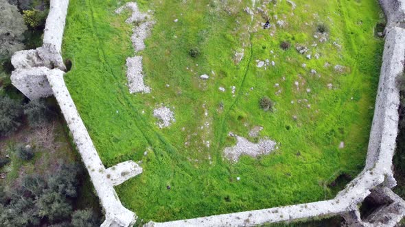 Marvelous aerial view flight Overfly drone footage of a castle ruins of a byzantine fortress of 13th