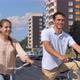 Happy Couple on Bicycles Exchange Glances Smiling - VideoHive Item for Sale