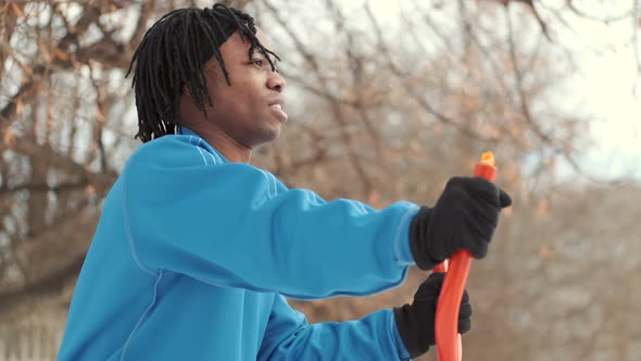 African American Man Footballer Warming Up on Sports Ground