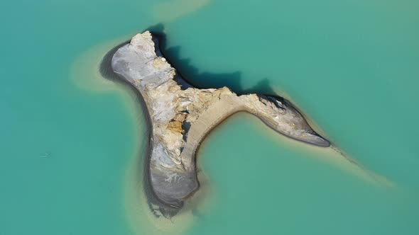 Drone View of the Turquoise Lake Formed As a Result of Mining Waste