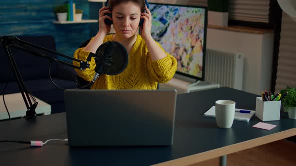 Creative Influencer with Headphones Preparing To Speak with Fans