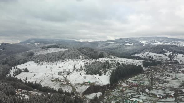 Flight Over the Mountains in Winter