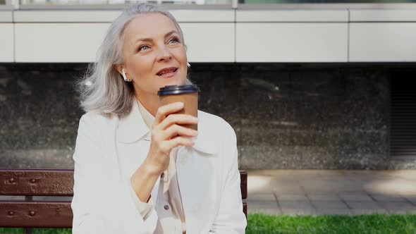 Senior woman drinking coffee