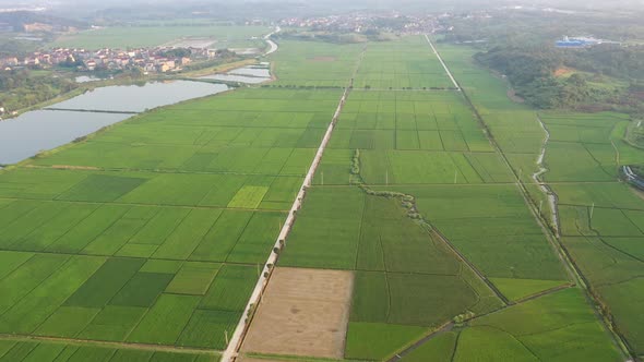 Mountain village and farmland in the sunset