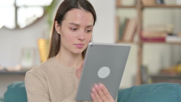 Young Woman Using Digital Tablet