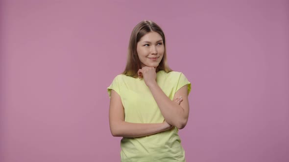 Portrait of Model with Natural Beauty Dreaming About Something Pleasant and Smiling