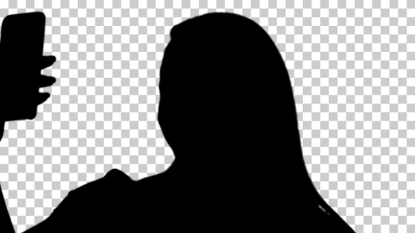 Silhouette girl taking a selfie, Alpha Channel