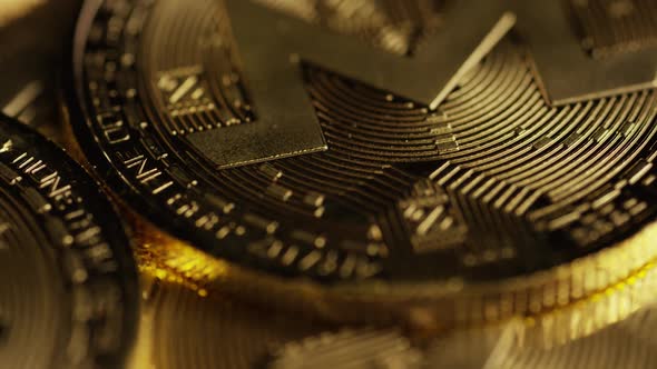 Rotating shot of Bitcoins (digital cryptocurrency) - BITCOIN MONERO 069