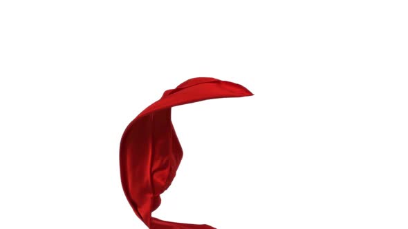 Red fabric flowing on white background, Slow Motion