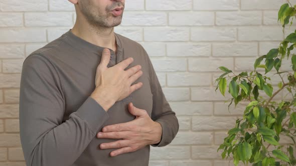 Man Inhaling Practices at Home