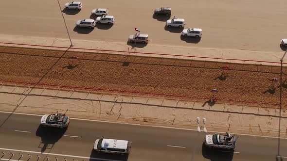 Aerial view of camel winning a race in the desert of Ras Al Khaimah, U.A.E.