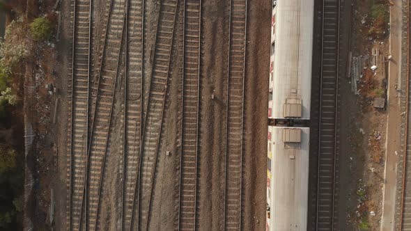 Overhead follow shot of local Mumbai train