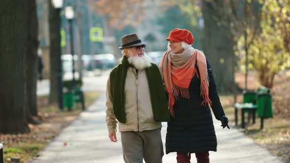 In Front of the Camera Walking Together Old Man