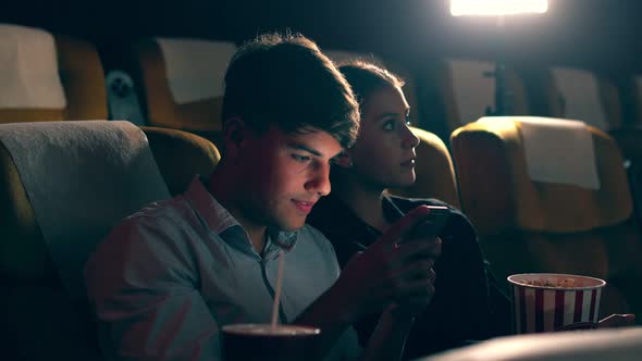 A Man Playing Mobile Phone Games