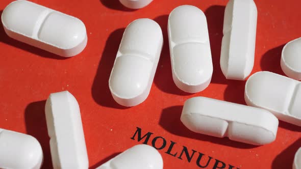 Closeup Shot of White Tablets on Red Background