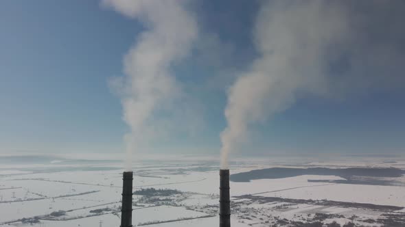 Aerial View of High Chimney Pipes with Grey Smoke From Coal Power Plant