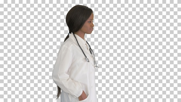 Sad African american female doctor walking, Alpha Channel