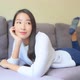 Asian woman sit on sofa and relax - VideoHive Item for Sale