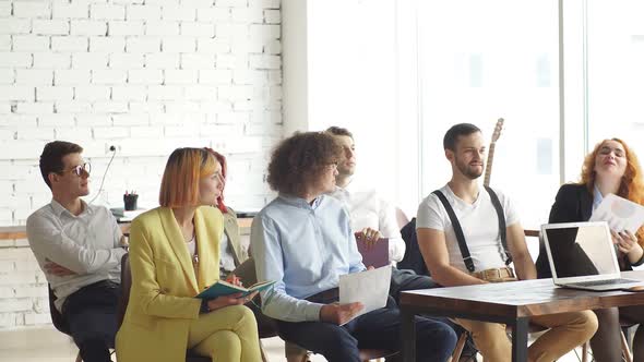 Business Professionals at the Presentation of a New Product Their Company Makes