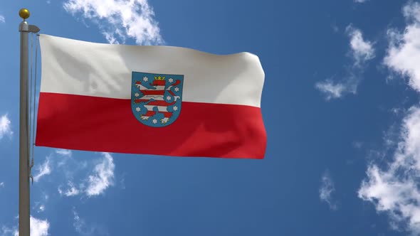 Thuringia Flag With Emblem (Germany) On Flagpole