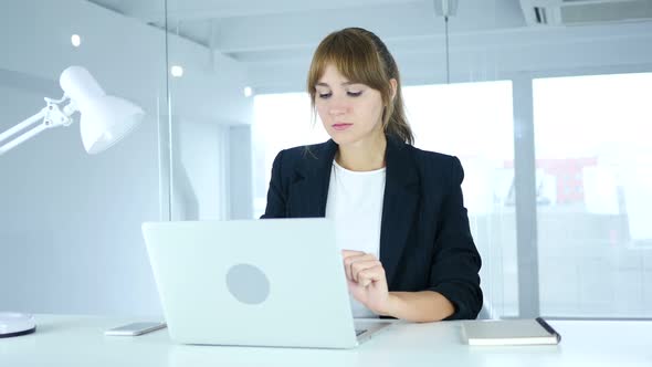 Businesswoman leaving Office after Completing Job