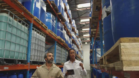 Workers interacting in a warehouse