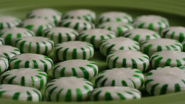 Rotating shot of spearmint hard candies - CANDY SPEARMINT 035