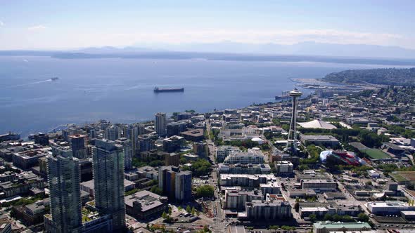 Aerial Flying Over Seattle Center With Puget Sound Background