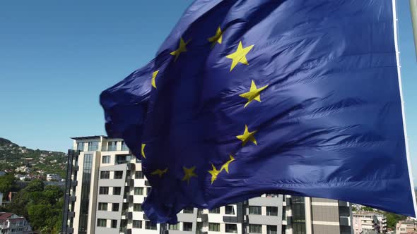 European Union Flag Against City at Summer Day