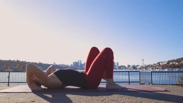 Backbend Yoga Pose Woman Stretching Her Abdominal Muscles Obliques And Legs In City Urban Waterfront