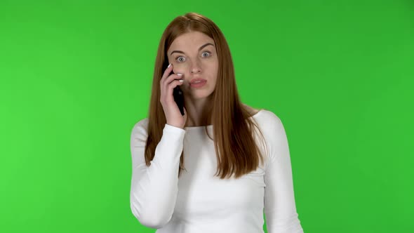 Portrait of Pretty Young Woman Talking for Mobile Phone