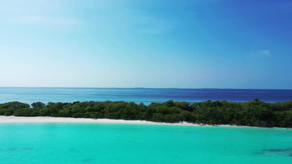 Aerial above panorama of tranquil coast beach vacation by aqua blue ocean and white sand background 