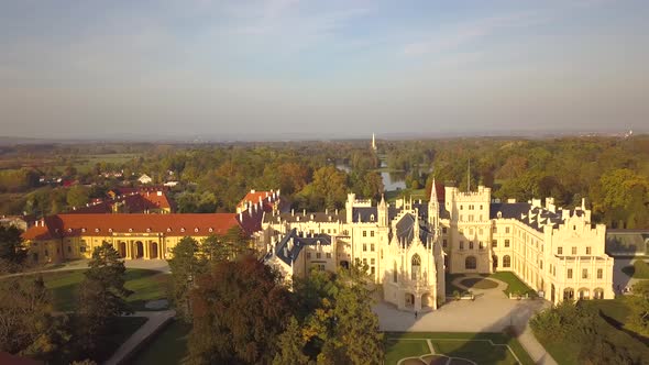 Aerial view of town Lednice and castle yard with green gardens in Moravia, Czech Republic.